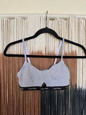White with black stripes Calvin Klein bralette with small cut out